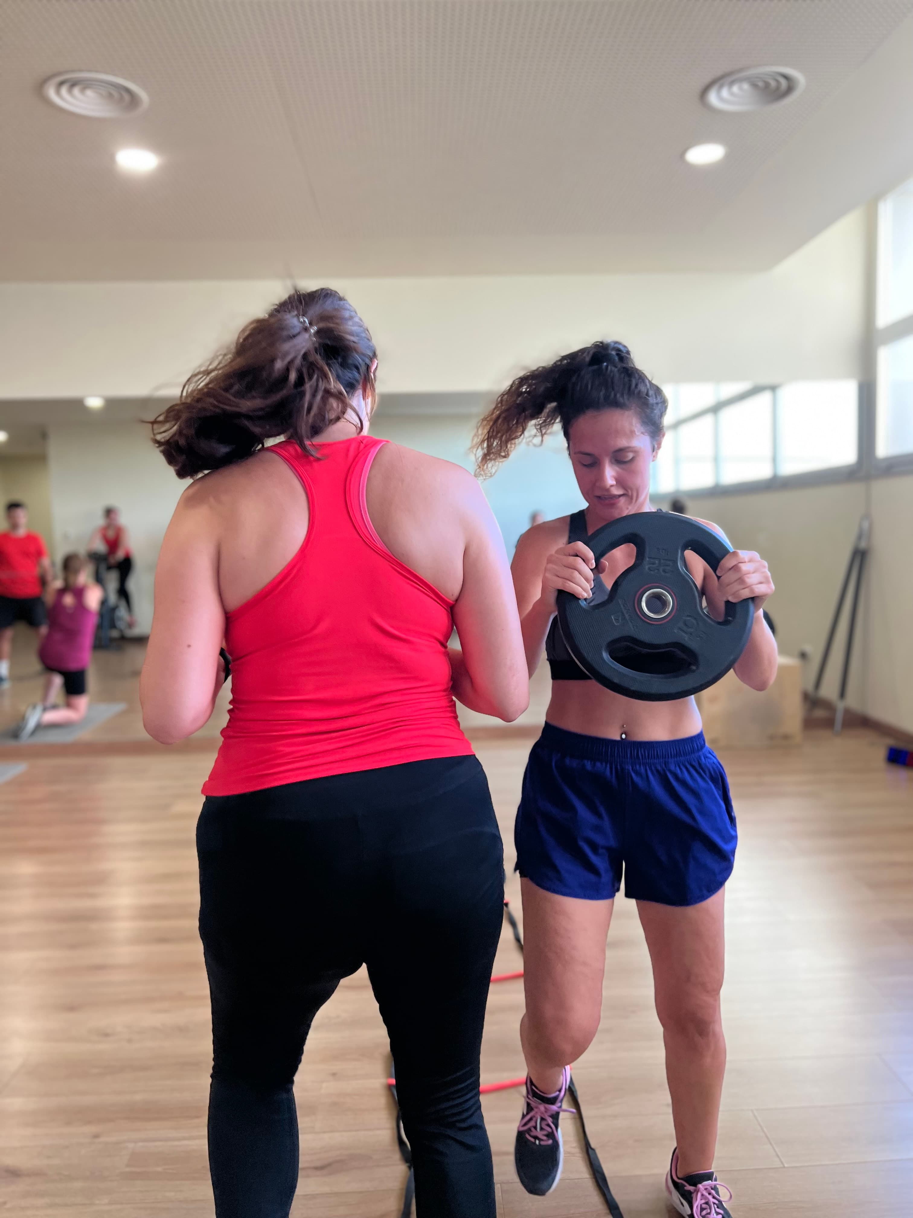 Exercici en parella amb disc